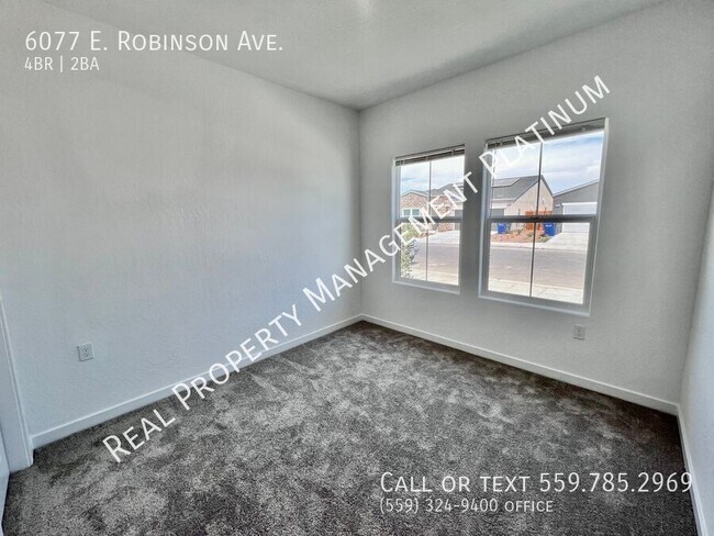 Building Photo - 6077 E Robinson Ave