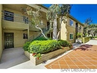 Building Photo - 7565 Charmant Dr