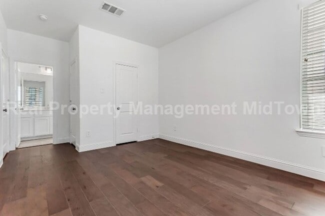 Building Photo - Live Elevated in the Heart of Viridian – S...