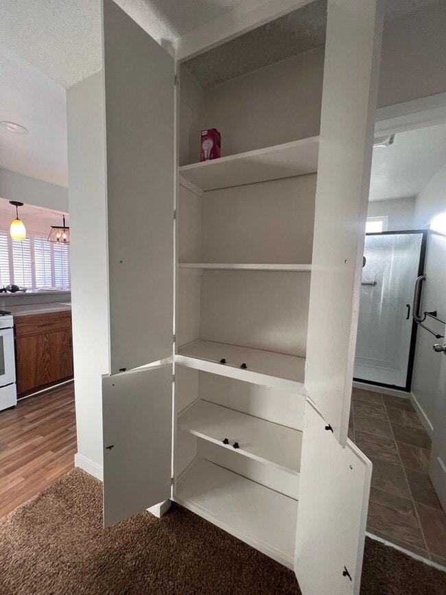 Building Photo - Private Back House with single garage & yard