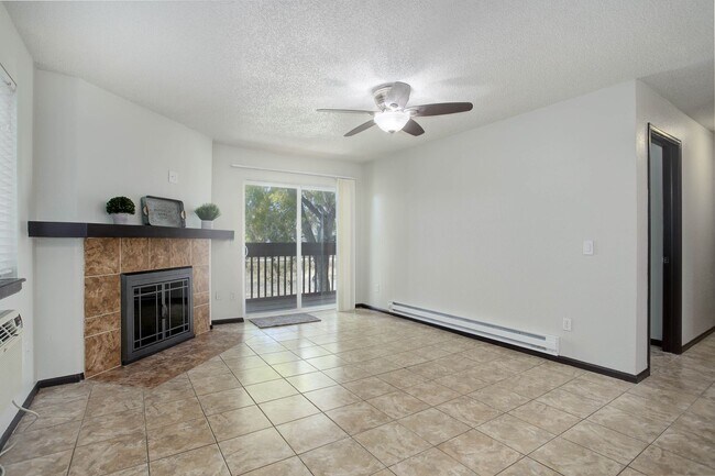 Building Photo - Penthouse level condo with views of canal and trail!