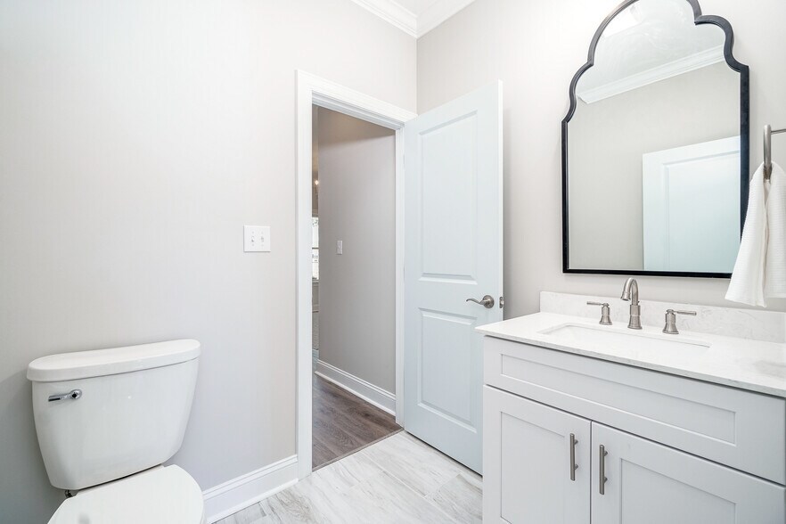 Brand new beach cottage! Public beach access at end of the street (4 min walk)! The guest bedroom bathroom is one of 3 full bathrooms! - 103 S 13th St