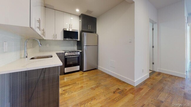 Building Photo - 138-28 Queens Blvd