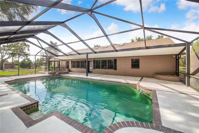 Building Photo - 7740 Lake Hatchineha Rd