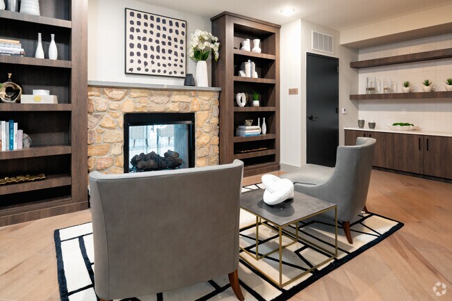Library with Fireplace - The Fritz Apartments