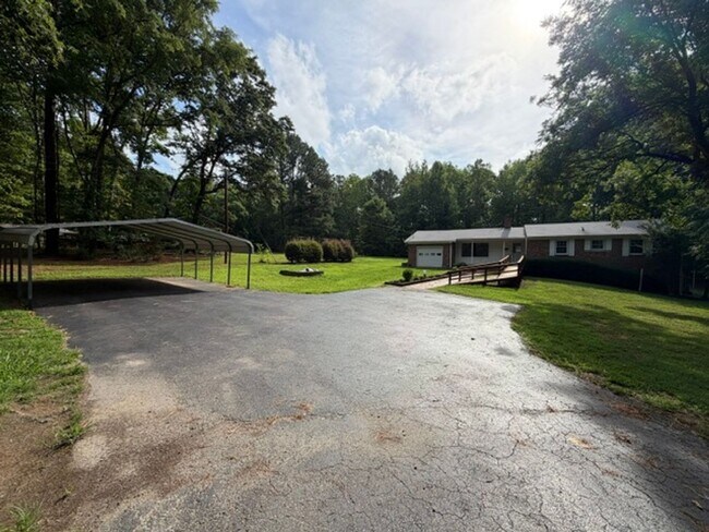 Building Photo - Landmark Living on The Avenue – 2 Private Acres on the Outskirts of Apex!  Limited Offer: One mon...
