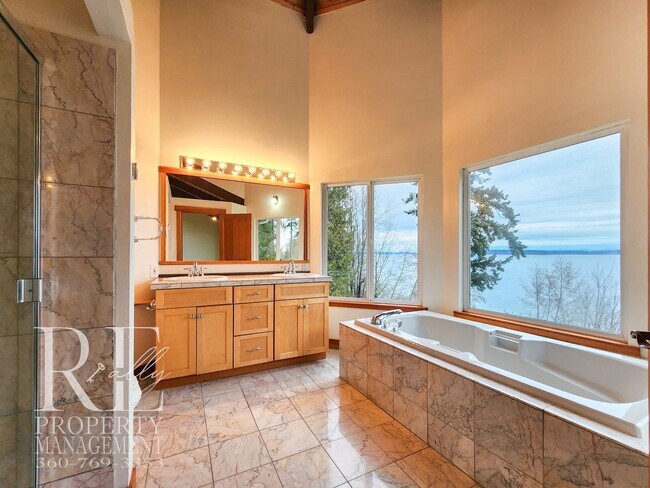 Building Photo - MOVE-IN SPECIAL: 50% OFF FIRST MONTHS RENT - Waterfront Rustic Retreat with Vaulted Ceilings, Pic...