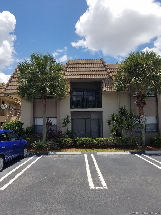 Building Photo - 10724 Royal Palm Blvd