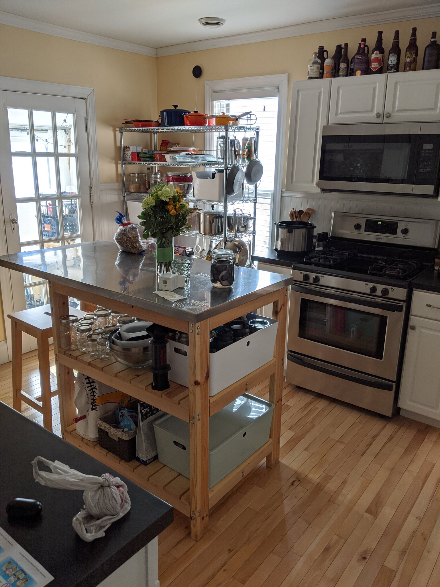 Kitchen looking to door to 3-season porch. - 1320 Jefferson St NE