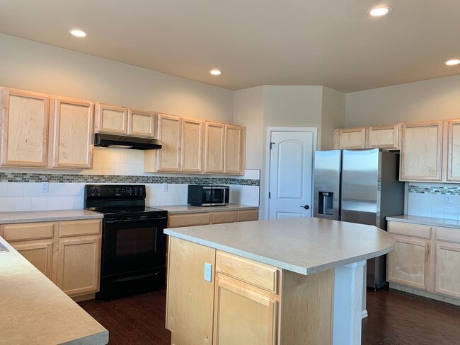 Building Photo - Beautiful 4 Bed/3 Bath West Greeley Home – Spacious Lot & Great Location!