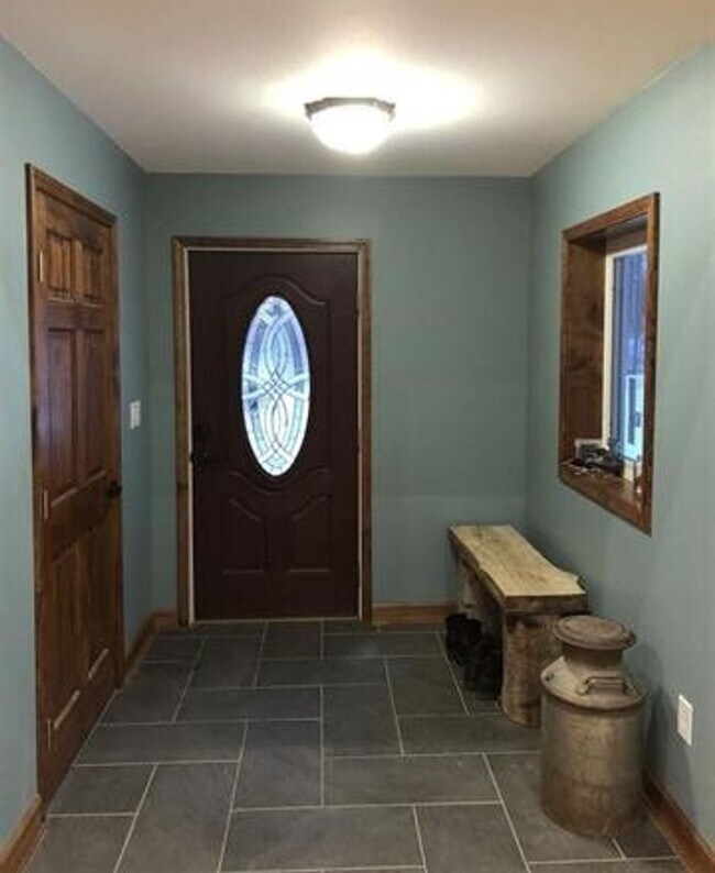 Building Photo - Tucked Away in Nature – Modern 3BR, 2BA Home