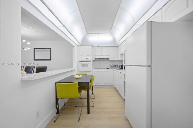 Building Photo - 19370 Collins Ave