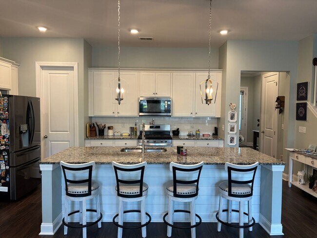 Building Photo - Spacious 4BR Townhome in Mount Pleasant | 2-Car Garage | Built 2020 | 2200 Sq Ft