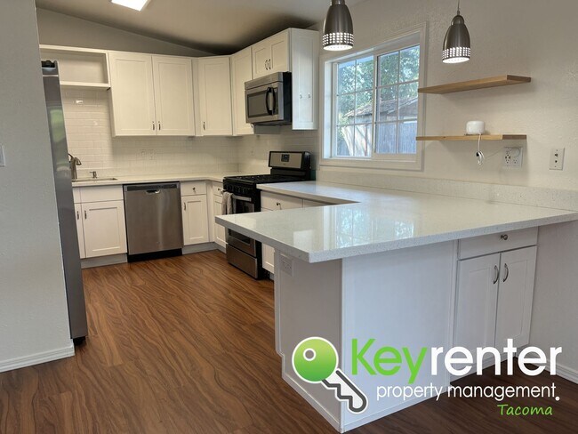 Building Photo - Beautiful 4-Bedroom Rambler in a Desirable...