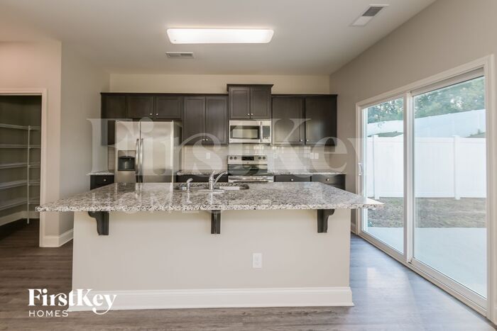 Building Photo - 9220 Evans Creek Ct