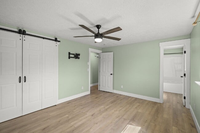 Building Photo - Charming 3-Bedroom Bend Home on 1/2 Acre with Expansive Yard, Mature Trees & Covered RV/Boat Storage