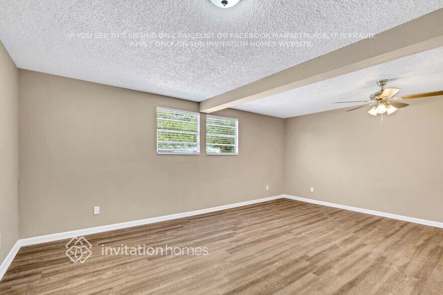 Building Photo - 6968 Delisle Dr