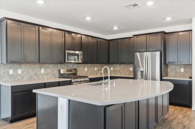 Building Photo - Spacious 5-bedroom home in gated community