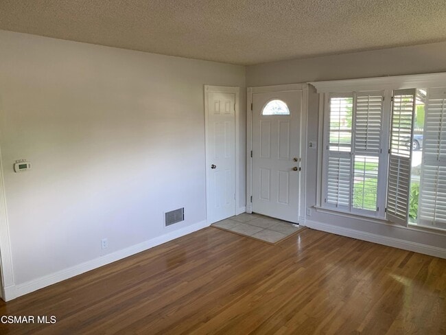 Building Photo - 7431 Cozycroft Ave