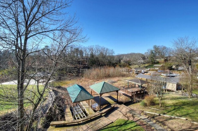 Building Photo - GORGEOUS LAKE HOUSE! 3 Bedrooms/3.5 Baths on Boone Lake, Private Dock, Fireplace & More! $3,900 m...