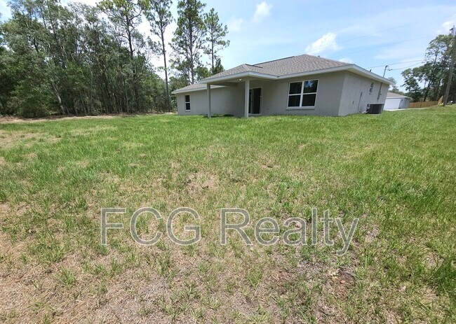 Building Photo - 9412 N Pineview Way