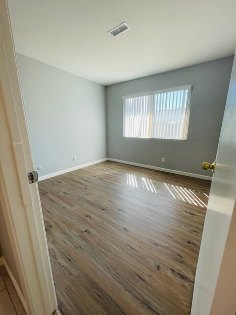 bedroom #1 has new water proof vinyl flooring & double pane window - 8164 Valley Green Dr