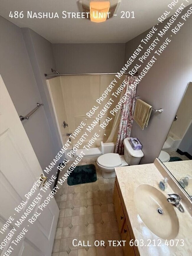 Building Photo - 486 Nashua St