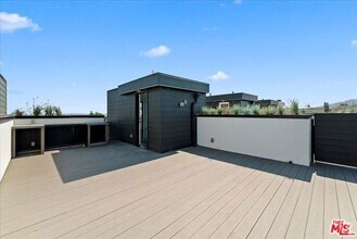 Building Photo - 1410 1/2 North Poinsettia Place, Los Angel...