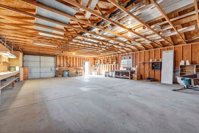 Building Photo - 20 Acre Ranch with House, Barn, Separate Workshop, and 5-Car Garage