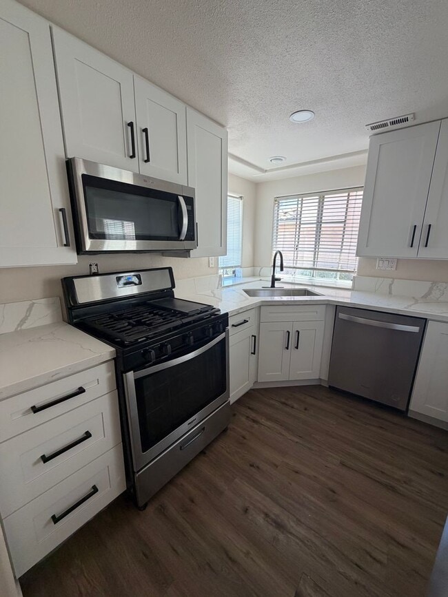 Building Photo - BEAUTIFULLY UPDATED RANCHO SAN DIEGO 3 BEDROOM HOME
