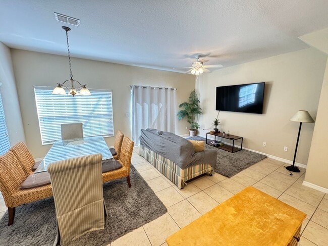 Building Photo - Fully Furnished 5-Bed End-Unit Townhome with Hot Tub in Gated Coral Cay! WASHER & DRYER INCLUDED!