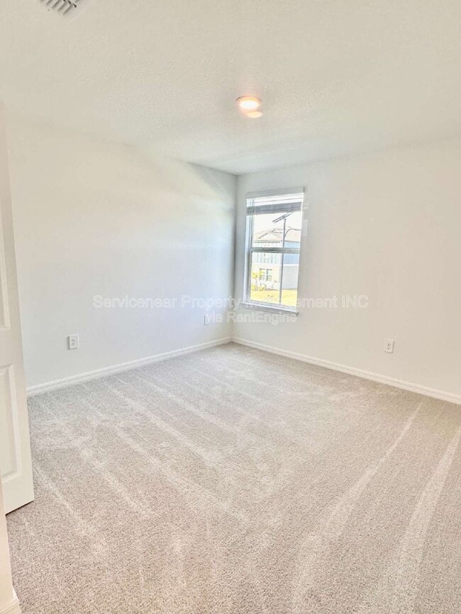 Building Photo - 8406 Blue Wave Ln E