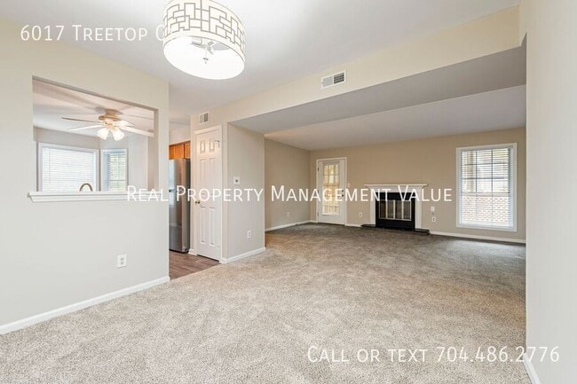 Building Photo - 6017 Treetop Ct