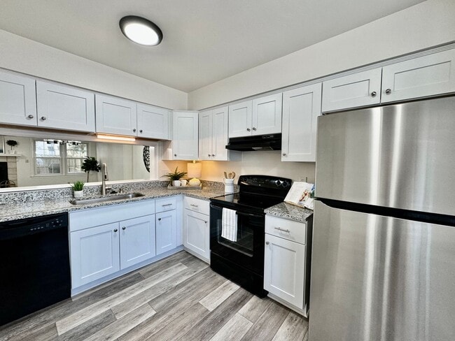 Building Photo - 3-Bedroom Townhome Ready NOW!! Completely Updated - Fenced Backyard - Exterior Storage!