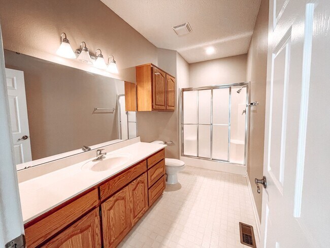 Building Photo - Introducing a stunning 3 bedroom, 2 bathroom home nestled in the serene surroundings of the East ...