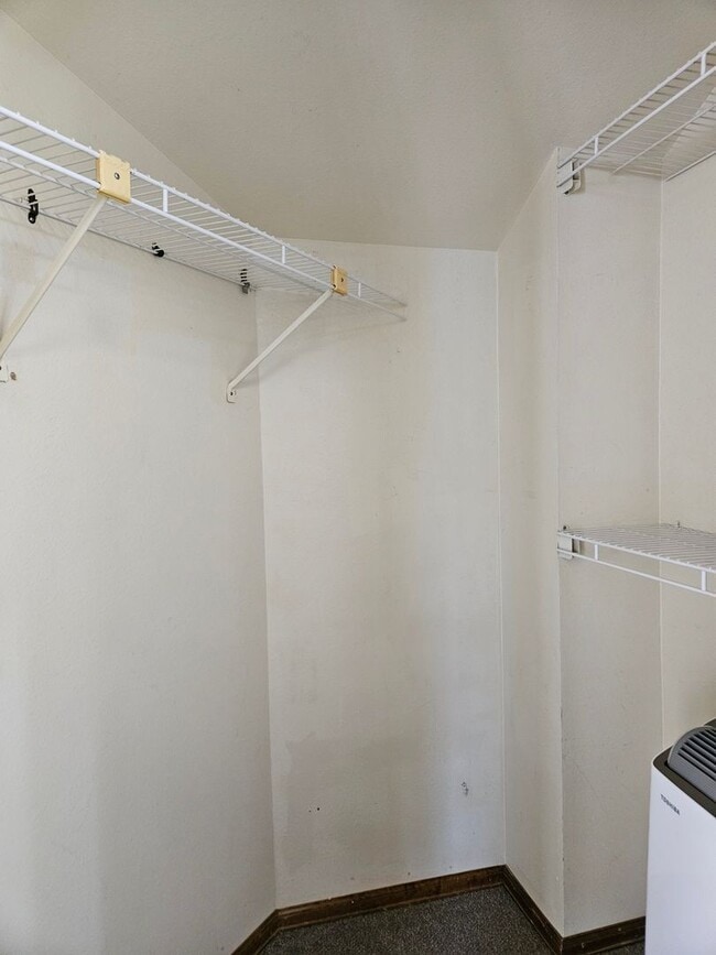 Building Photo - Adorable Loft Style One Bedroom Condo Steps from Buckley AFB