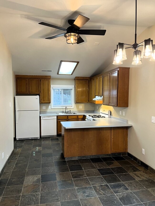 Building Photo - Newley updated 3-bedroom home features fen...