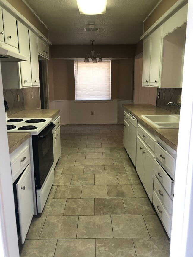 Kitchen view from front entry way - 8309 Geneva Ave