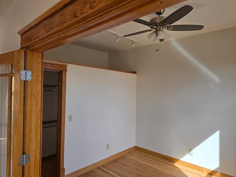 Front bedroom/office closet and overhead storage - 1204 N Kedzie Ave