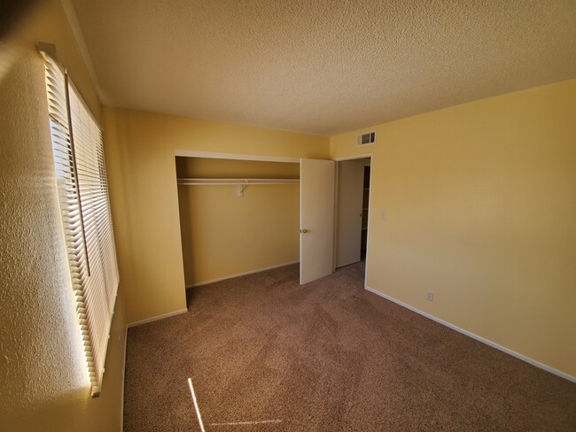 Spacious bedroom is approximately 13 x 13 with natural light! - 155 Lee Ave