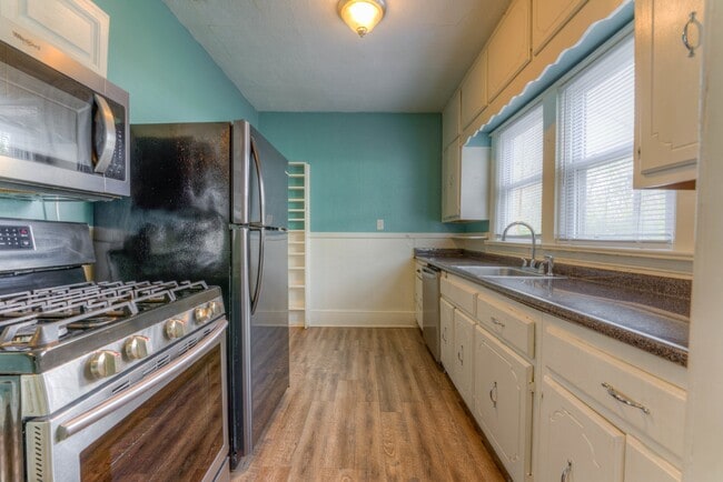 Building Photo - Limited Time: Qualified Tenants Get Half P...