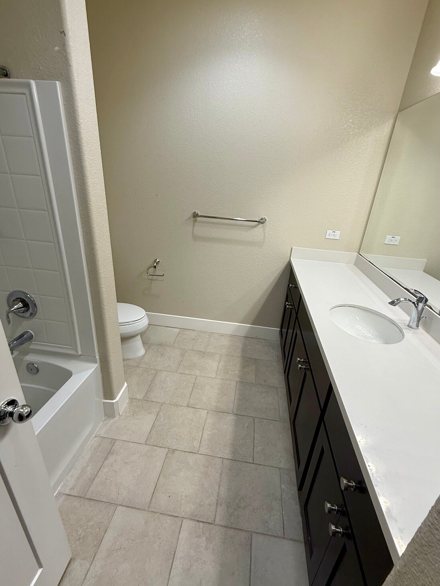 Spacious Second Bath, with a LONG countertop .. look at that and GREAT STORAGE. - 27 Rogers Ln
