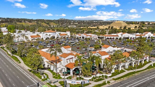 Building Photo - Lake and Golf Course View- Remodeled Condo w/ 2 Car Garage!