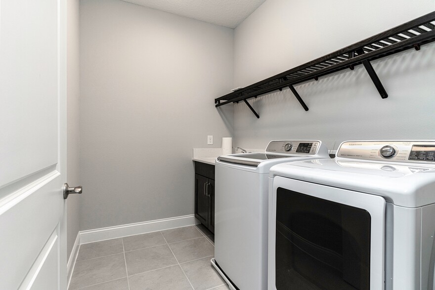 Upstairs Laundry Room - 10146 Royal Island Ct