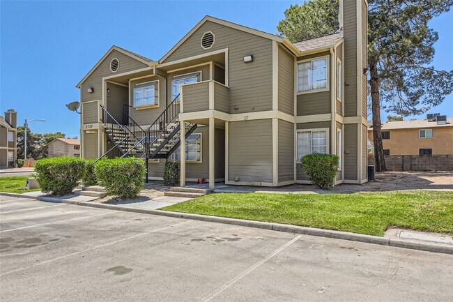 Building Photo - 2nd Story 2-Bed Condo with Tile Fireplace