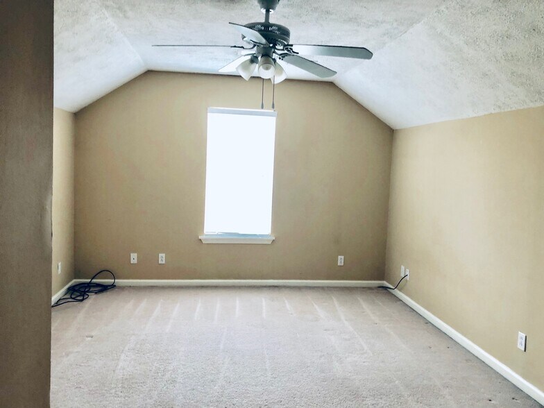 Bonus room, above garage. - 141 S Birchwood Dr