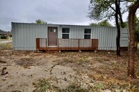 Building Photo - FOR LEASE! 1 BR - 1 BA - 325 sf - Container Home. All Utilities (Electricity, Water, Sewer & Garb...