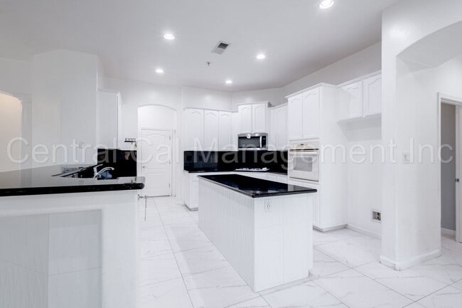 Building Photo - 4 Bedroom/3 Bath Home with Paid Solar - $3295 Per Month!