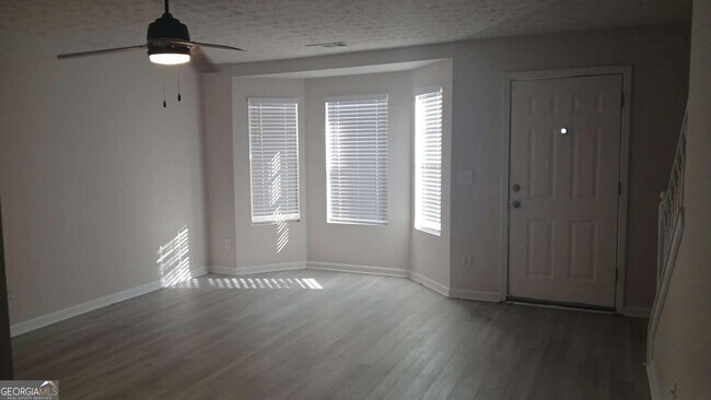 Building Photo - 5677 Wind Gate Ln