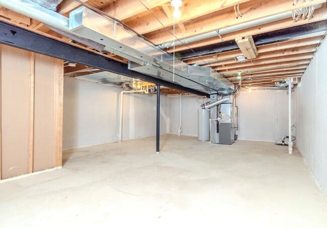 Building Photo - Stunning 2BR/2.5BA Townhouse with Dual Primary Suites, 2-Car Garage & Bonus Loft